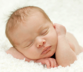 An infant sleeping peacefully